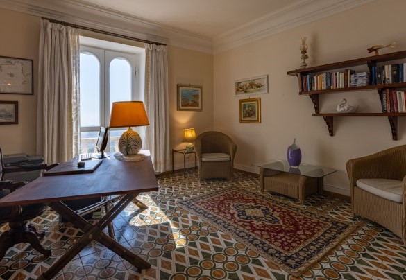 The large hallway, leading to the suites on first floor, consists of an open-plan studio with a panoramic view – Villa Carina