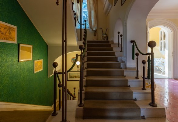 A large staircase leads up to the top floor and down to the basement – Villa Carina