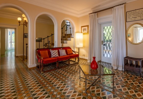 The large hallway, leading to the suites on first floor, contains an open-plan studio with a panoramic view – Villa Carina