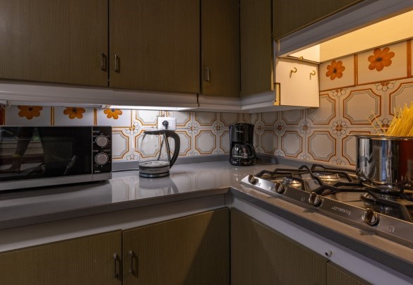 Kitchen with direct access to the garden on the ground floor – Villa Carina