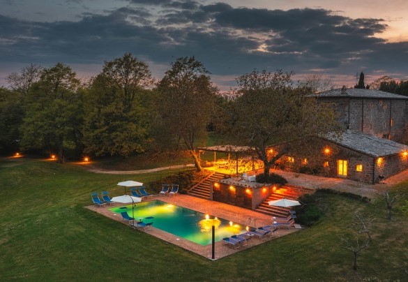 The property lit up with soft lights- Villa Carmeli