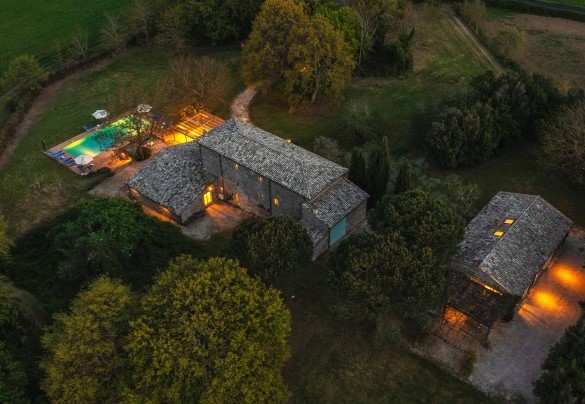 The property lit up with soft lights- Villa Carmeli