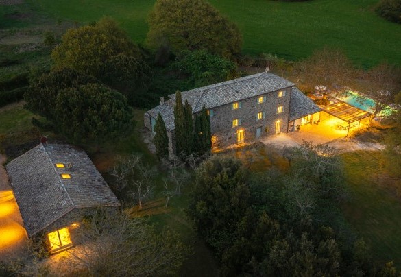The property lit up with soft lights- Villa Carmeli