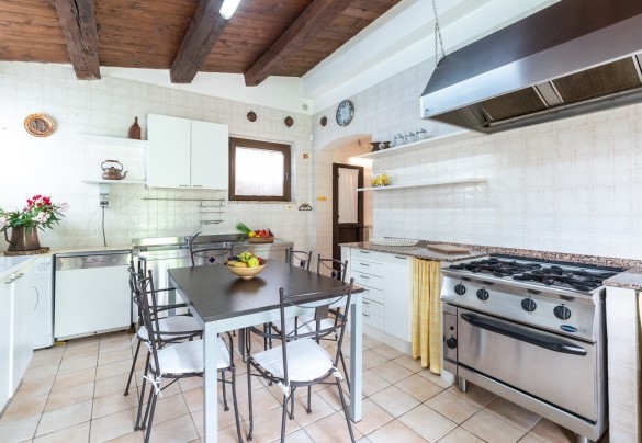 High-end appliances surround the kitchen - Villa Casanostra