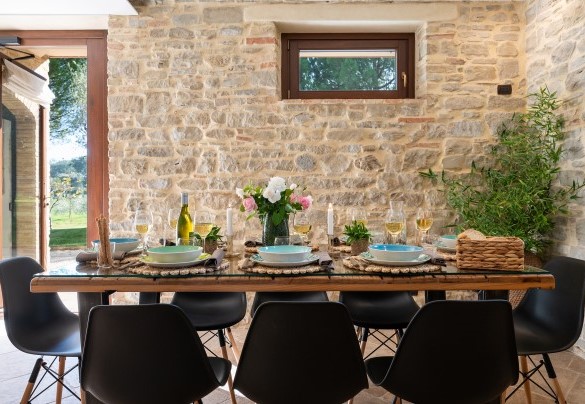The dining area with the table set up - Villa Cherubini