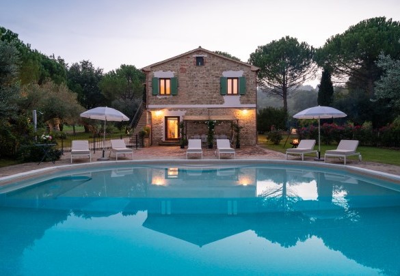 The captivating solarium surrounds the pool  - Villa Cherubini