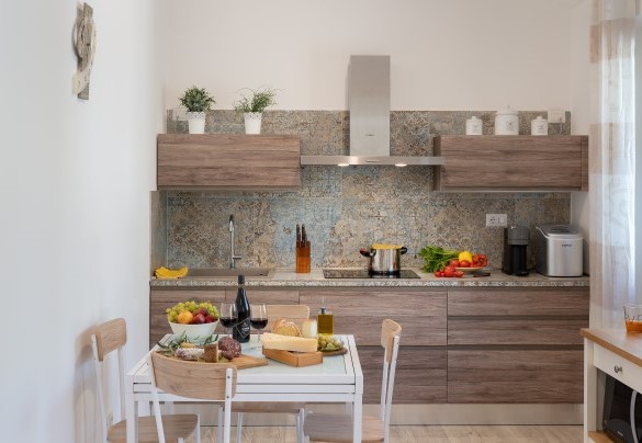 The kitchen with dining area - Villa Cristina   