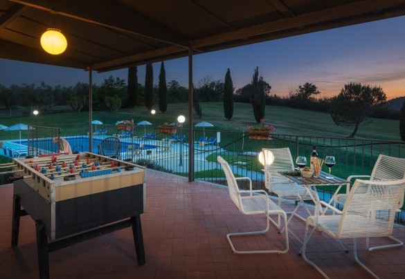 The illuminated veranda in the evening - Villa Croci