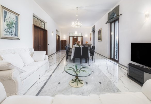 The dining room with living and tv – Villa Croci 