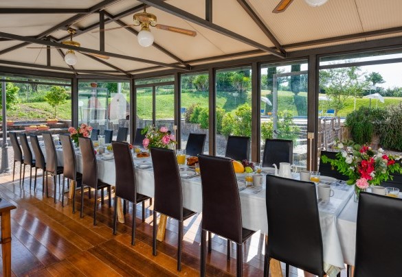 Gazebo between the villa and the pool, convenient for casual dining – Villa Croci 