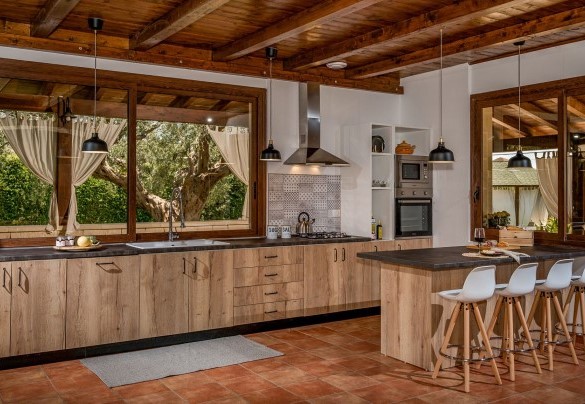 La cucina moderna include una comoda isola centrale - Villa Cutrera