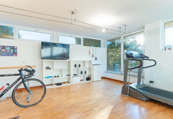 L'area fitness é dotata di attrezzi gym - Villa degli Ulivi