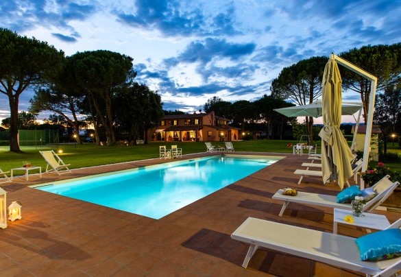 The sunset behind the hills and the park which lights – Villa Elisa 