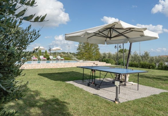 The ping-pong table located near the house and the pool - Villa Gabri