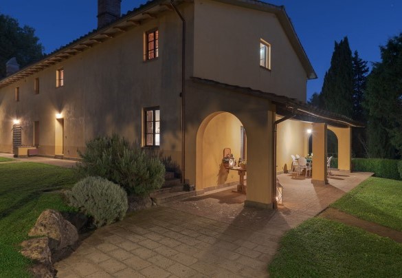 The characteristic portico at dusk – Villa Ginestraio