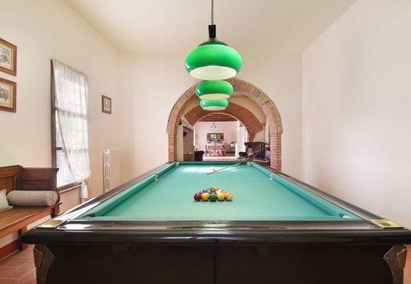 The billiard room overlooking the living area – Villa Ginestraio 