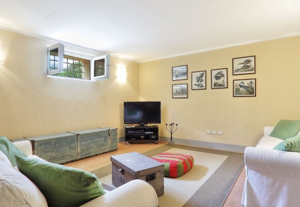 The TV lounge on the basement floor - Villa Il Meluccio
