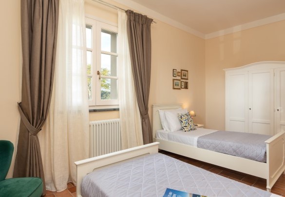 The twin bedroom no. 2 (unit 1) on the ground floor – Villa Iole