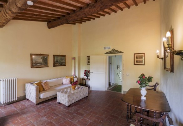 The living room communicates with the stairs to the ground floor - Villa Iside  