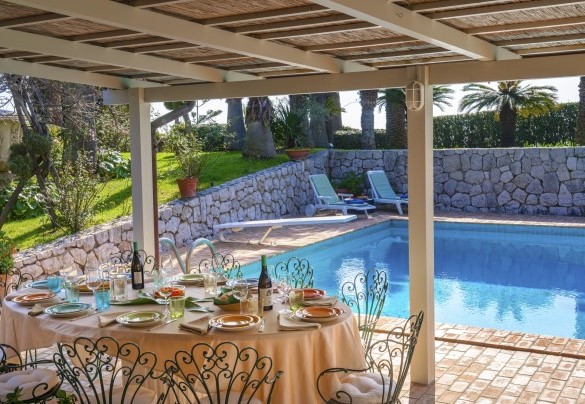 The large pergola that houses the table for banquets by the pool - Villa La Cicaliera