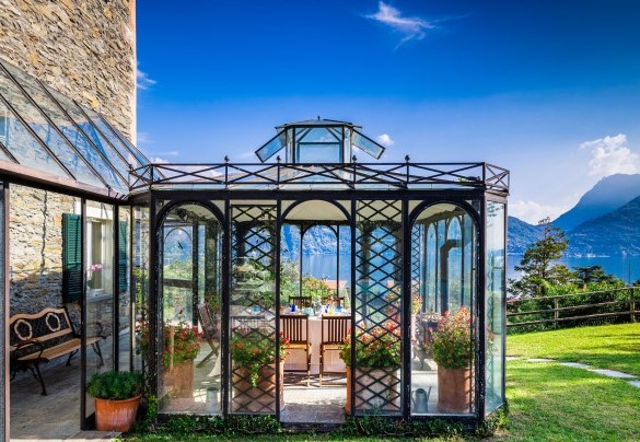 A winter garden used as a dining area is located near the swimming pool and is also connected to the living room - Villa La Dolce