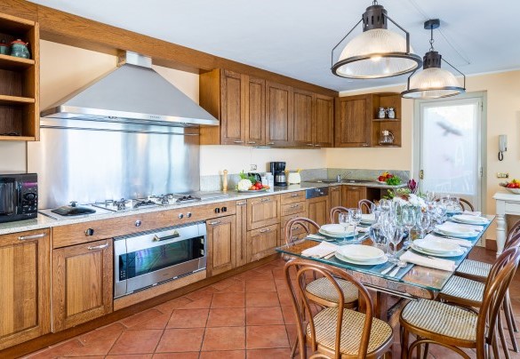 fully-equipped kitchen with direct access out to the large terrace - Villa La Dolce