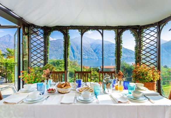 A winter garden used as a dining area is located near the swimming pool and is also connected to the living room - Villa La Dolce