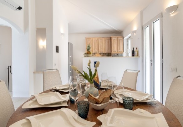 Dining table in the living room – Villa La Maddalena