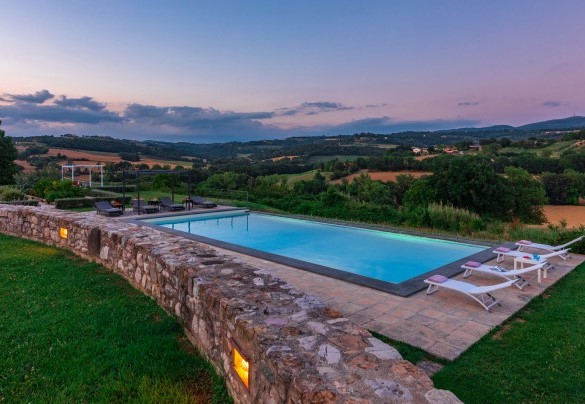 The beautiful infinity pool is located on the lower terrace of the property - Villa Le Fontane  