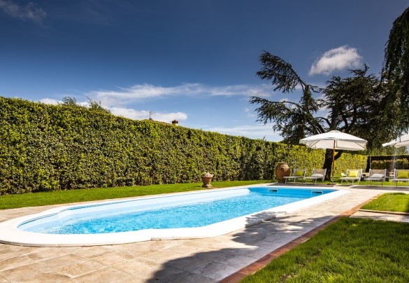 The pool located at the side of the villa – Villa Luigina