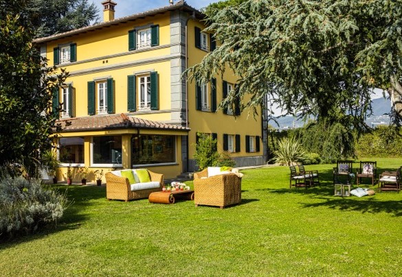 The shaded living area by the pool – Villa Luigina