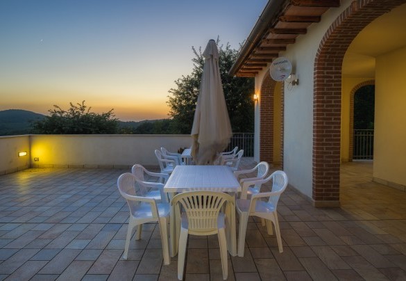 Terrace with sitting area positioned to enjoy the view - Villa Maggiorana