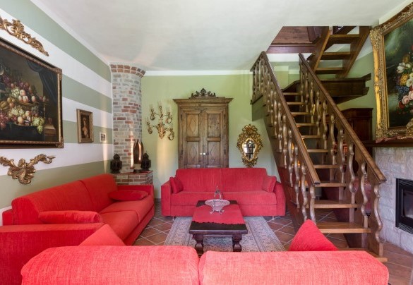 The main living room of the villa with a fireplace - Villa Miki