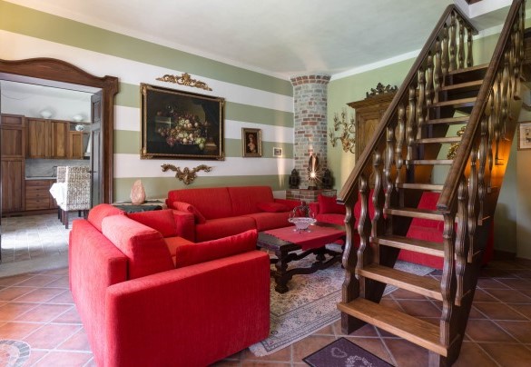 The main living room of the villa with a fireplace - Villa Miki