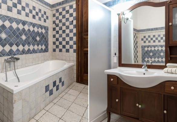The bathroom on the ground floor with mosaic tiles and a bathtub - Villa Miki