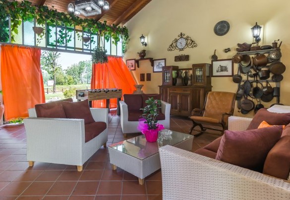 The living area of the porch - Villa Miki