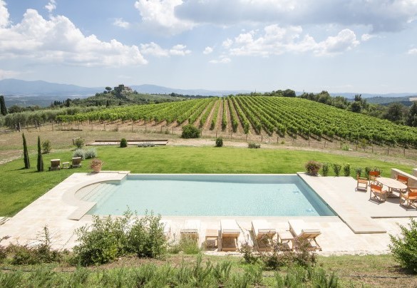 The infinity pool is lined internally with tiles and bordered by stone paving – Villa Nicola