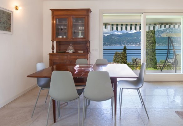 Dining table with chairs on the upper floor and panoramic view - Villa Palladini