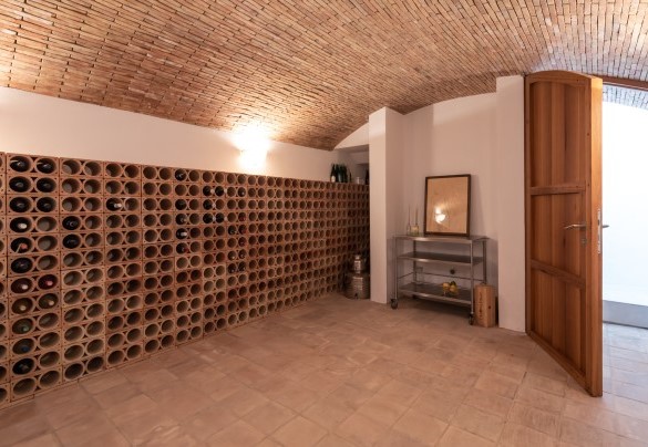 The cellar located under the portico and accessible via an automated wooden door and internal staircase - Villa Petrillo