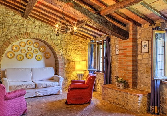 Salotto al piano terra nella casa principale - Villa Poggiente