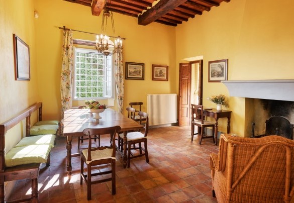 Sala polivalente con caminetto al piano terra App. 1 - Villa Primo Sole