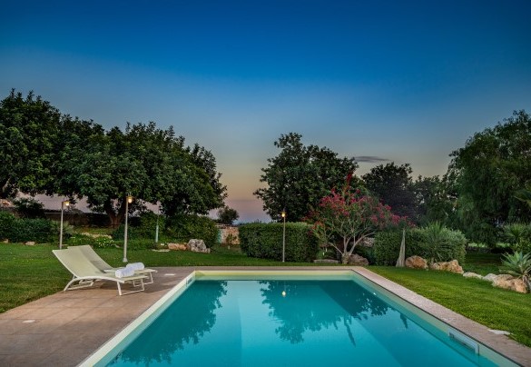The pool area by night - Villa Ramunna