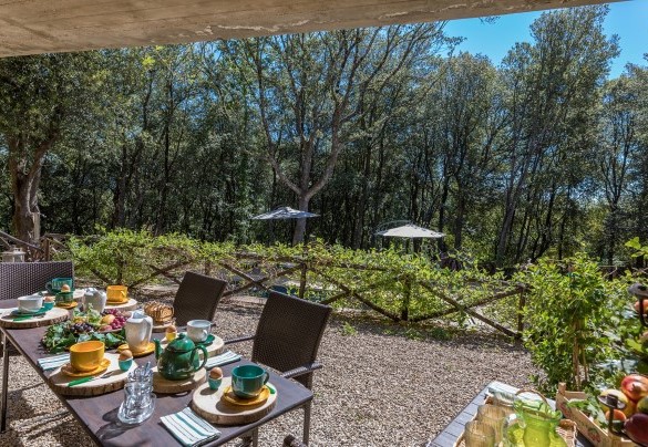 The outdoor dining area at the exit of the living room   -Villa Rinaldi