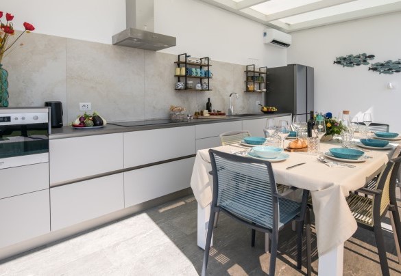 The fully equipped kitchen with air conditioning - Villa Sabbie Rosse