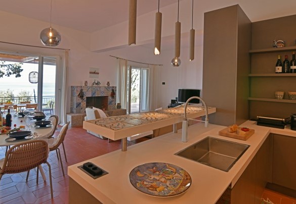 The spacious living area is directly connected to the outdoor terrace – Villa Armonia