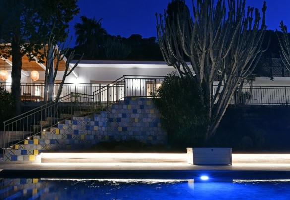 The pool area is located on a terrace below the villa, reached down a flight of steps - Villa Armonia