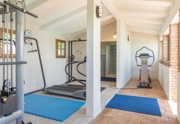 L’area fitness con bagno con doccia- Villa Siena