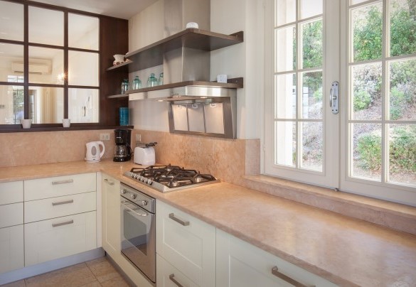 Upper-floor kitchen connected to the living room	 - Villa Sorte
