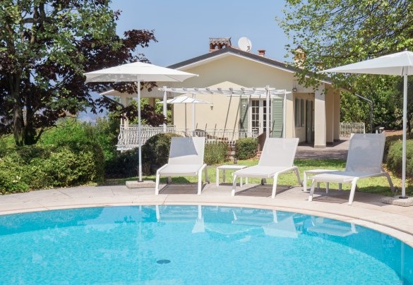 By the poolside you can relax on the sun loungers - Villa Sorte