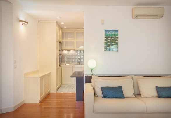 From the lower-floor living room there is access to the laundry area at the back of the house - Villa Sorte